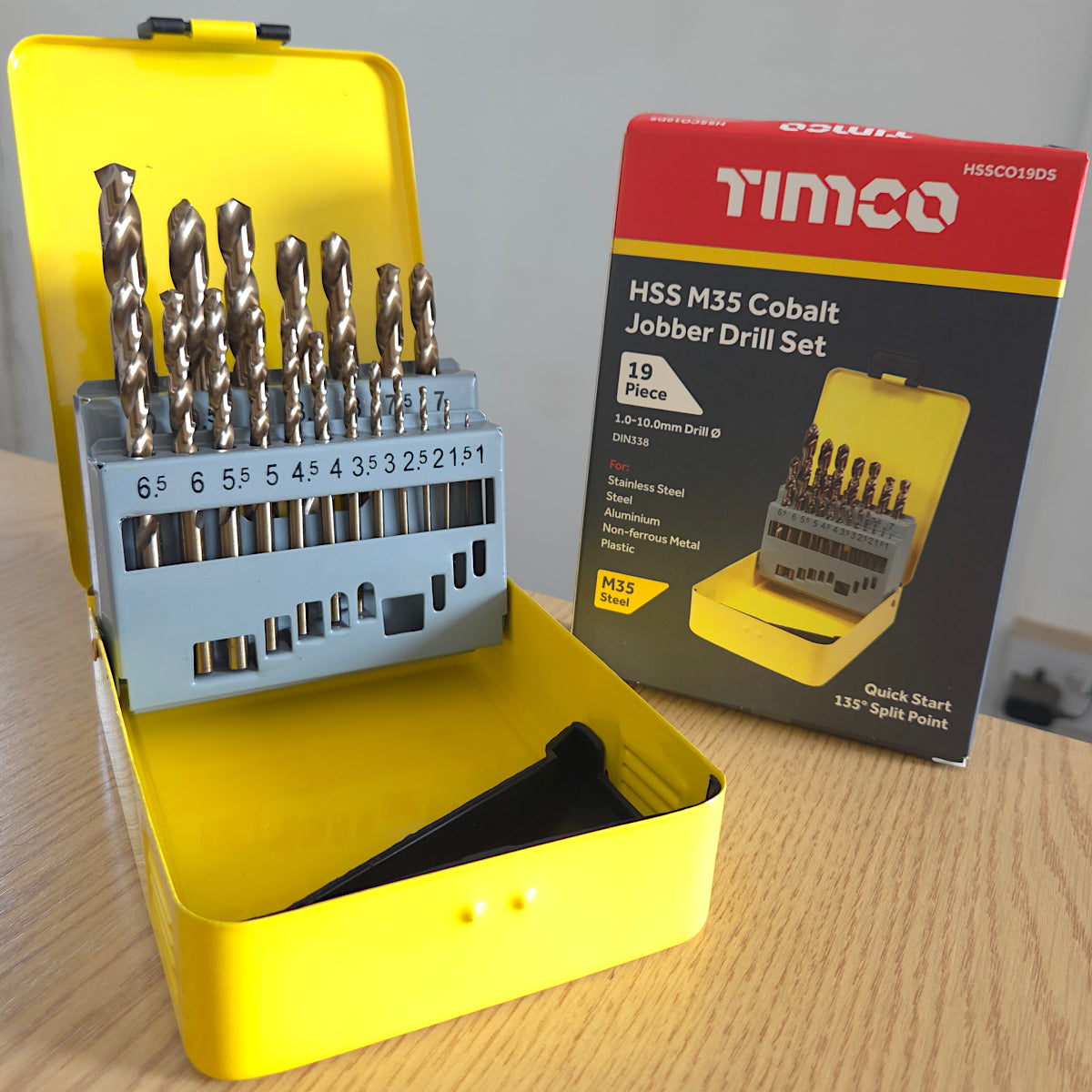 Timco HSS M35 Cobalt Jobber Drill Set with yellow case and packaging on a wooden surface.