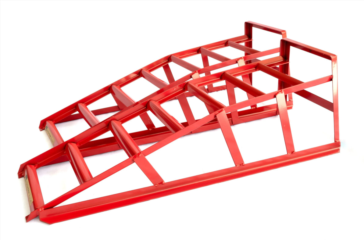 Red metal ramp on a white background