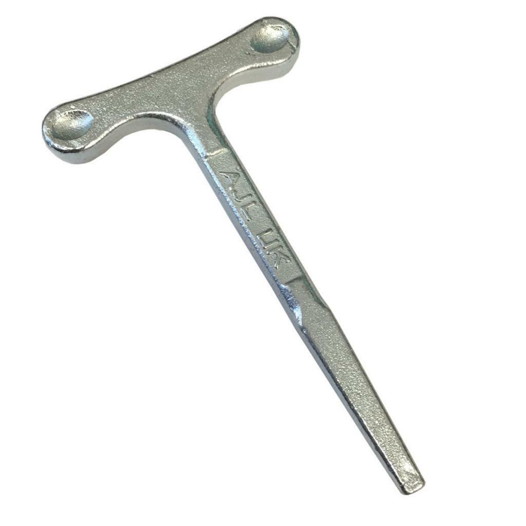 Metal T-wrench on a white background