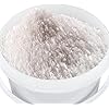 White powder in a white bowl on a white background