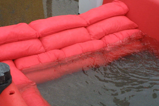 HydroSnake absorbing water in situ and forming a protective flood barrier