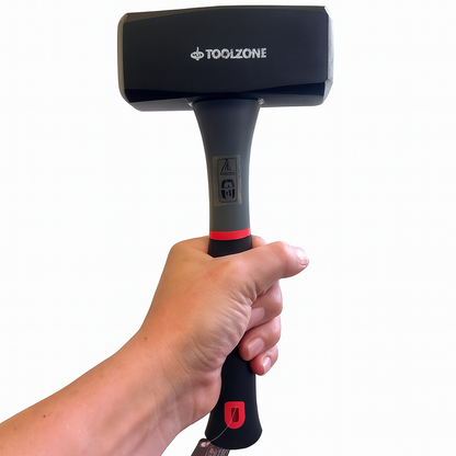 Hand holding a black mallet with Toolzone branding on a white background