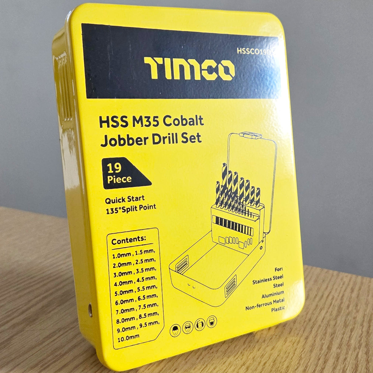 Timco HSS M35 Cobalt Jobber Drill Set packaging on a wooden surface with a gray background