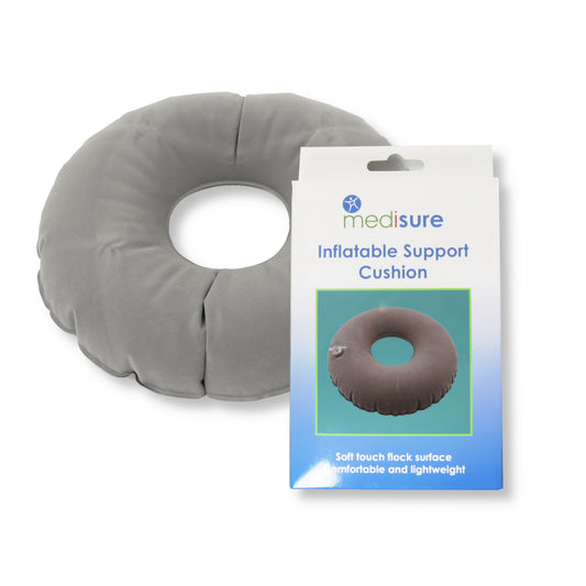 Gray inflatable support cushion with Medisure packaging on a white background