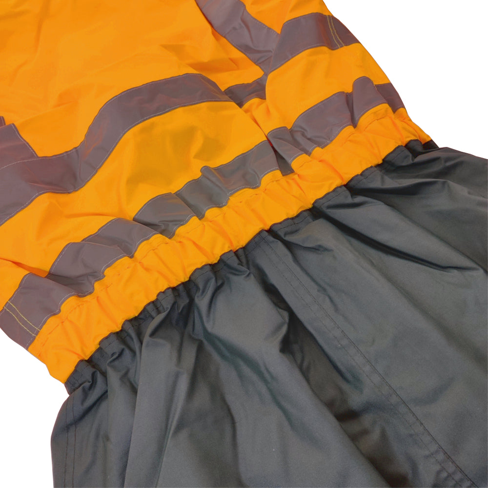 Close-up of a gray and orange fabric with a textured pattern on a white background
