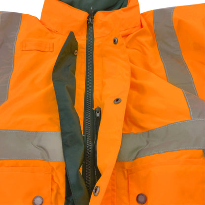 Close-up of an orange safety jacket with reflective stripes