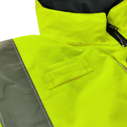 Close-up of a high-visibility jacket with a brand label on a white background