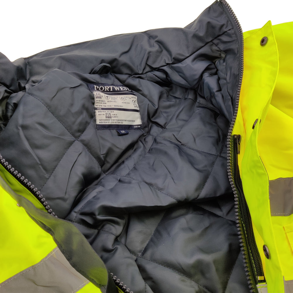 Close-up of a Portwest branded jacket with a visible label on a white background
